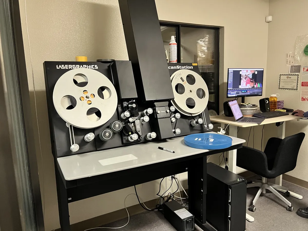 A 16mm film scanner. It's almost a meter tall and has one big reel on each of its sides